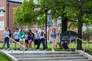Visitors Walking Grasselli Library Stairs