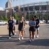 Students Walking Near Ballpark Branded Shirts