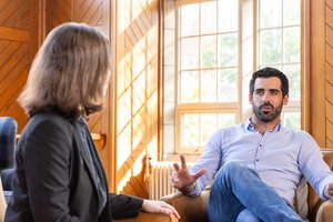 Counseling Man Sitting Down Talking