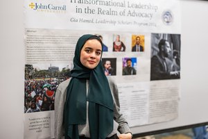 Young Woman Wearing Dark Green Hijab Gray Sweater
